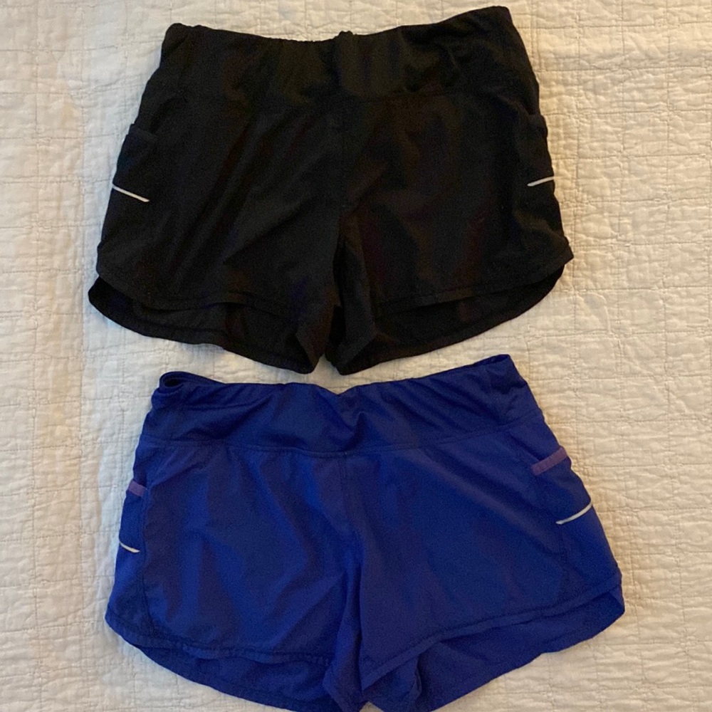Two pair Athleta workout Shorts Medium